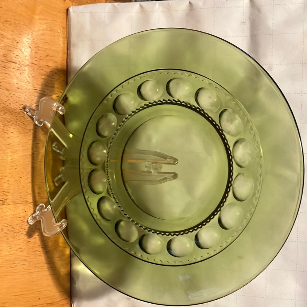 Vintage. from 1970s olive green glass 8” circular dish with great small circle